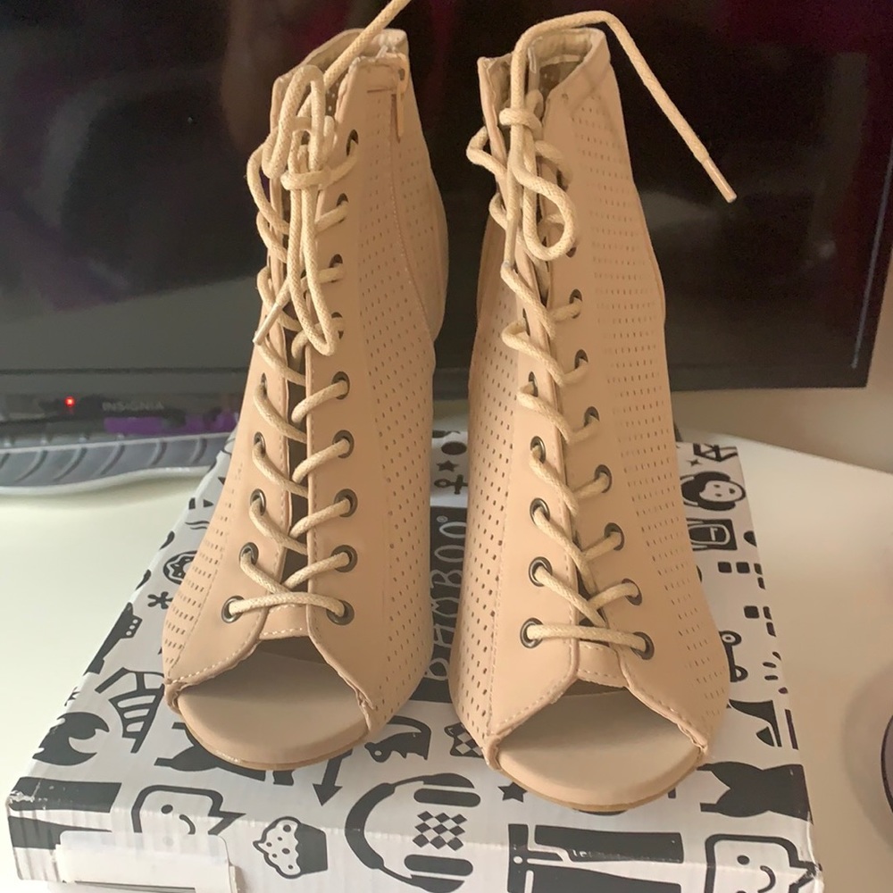 High heeled open toe boots